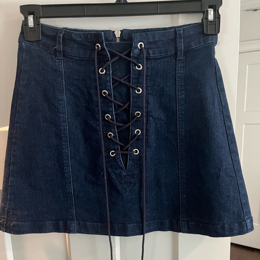 Never worn lace up denim skirt size M
